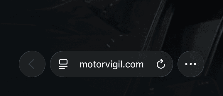 One of Safari's toolbar layouts, showing motorvigil.com and a ⋯ button at the right. Yours may show a tabs button there instead, with the same menu behind the page icon in the address bar.